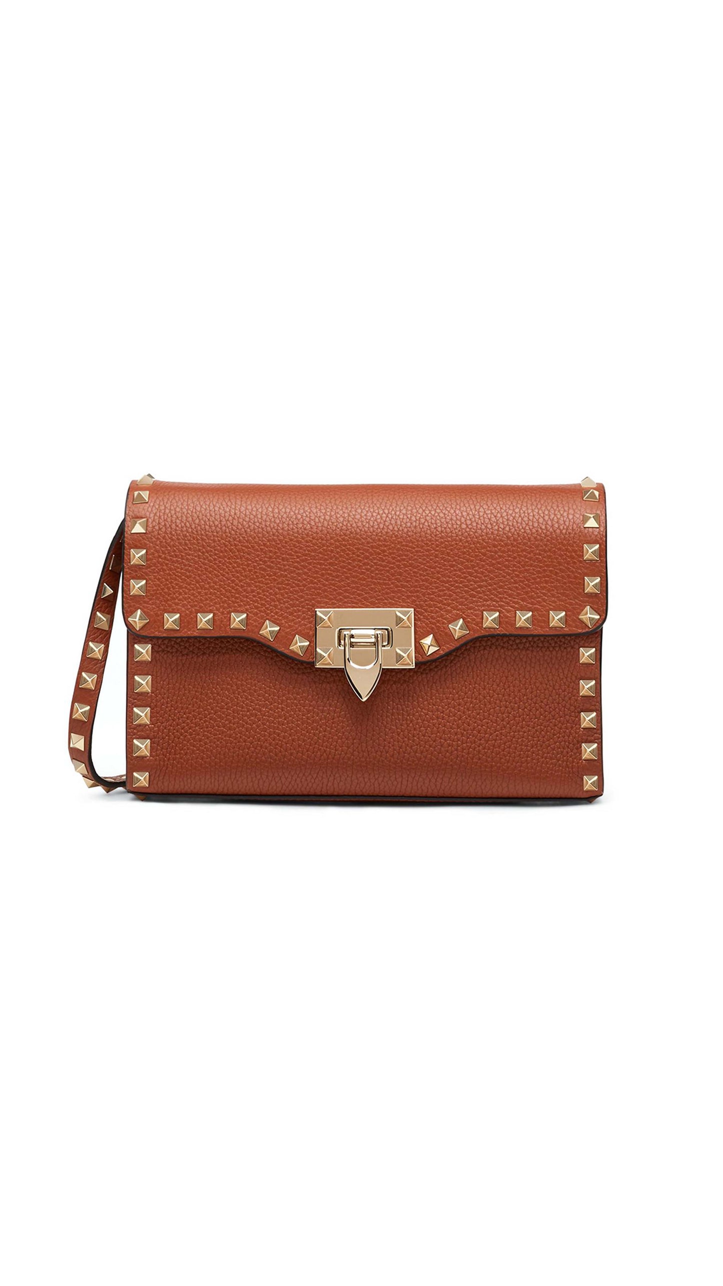 Small Rockstud Grainy Calfskin Crossbody Bag - Saddle Brown