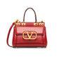 Small Rockstud Alcove Handbag In Grainy Calfskin - Red